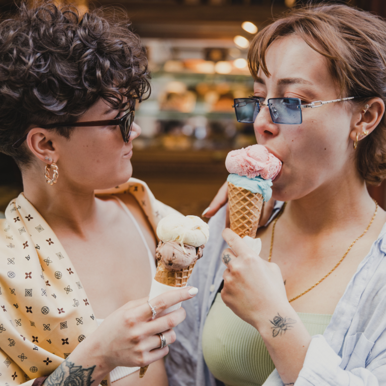 A queer couple on an ice cream date in PEI.